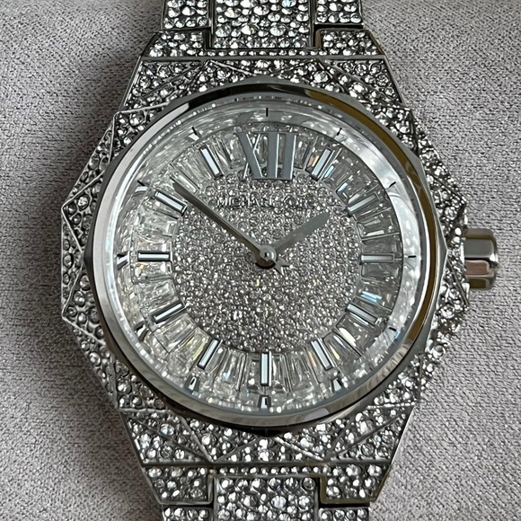 Micheal Kors Women’s Oversized Raquel Pavé Silver-Tone Watch
Case Size: 41mm - Picture 1 of 10